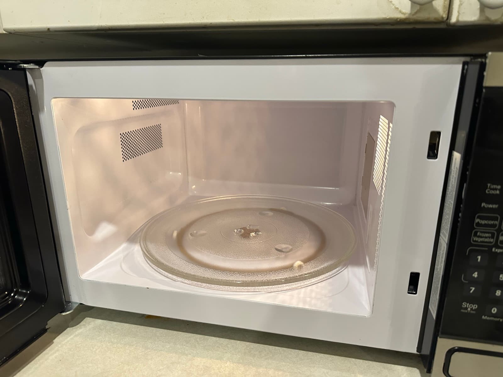 After cleaning — Streak-free interior, plate sanitized